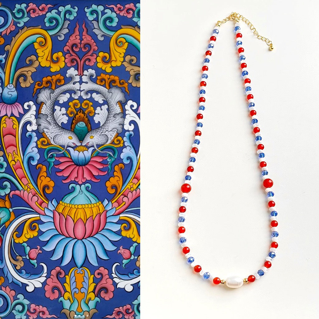 Blue and red pearl necklace